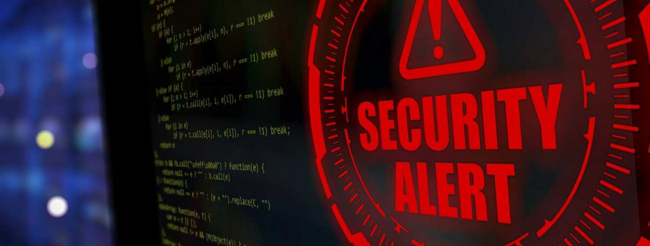 Security alert warning on a screen with code, symbolizing potential smart home security threats.